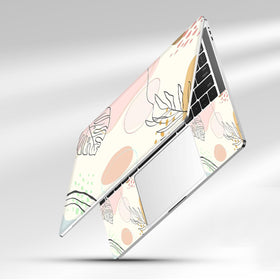 NXZGO boho leaf laptop skin packaging protects during shipping.