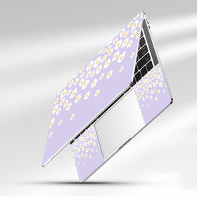 NXZGO Lavender Happy Flower laptop skin side installation shows easy trim for universal fit.