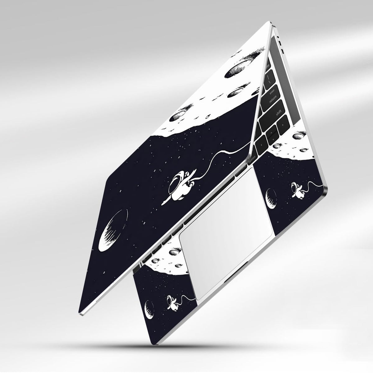 NXZGO Space Astronaut durable-material shot suggests everyday laptop protection.