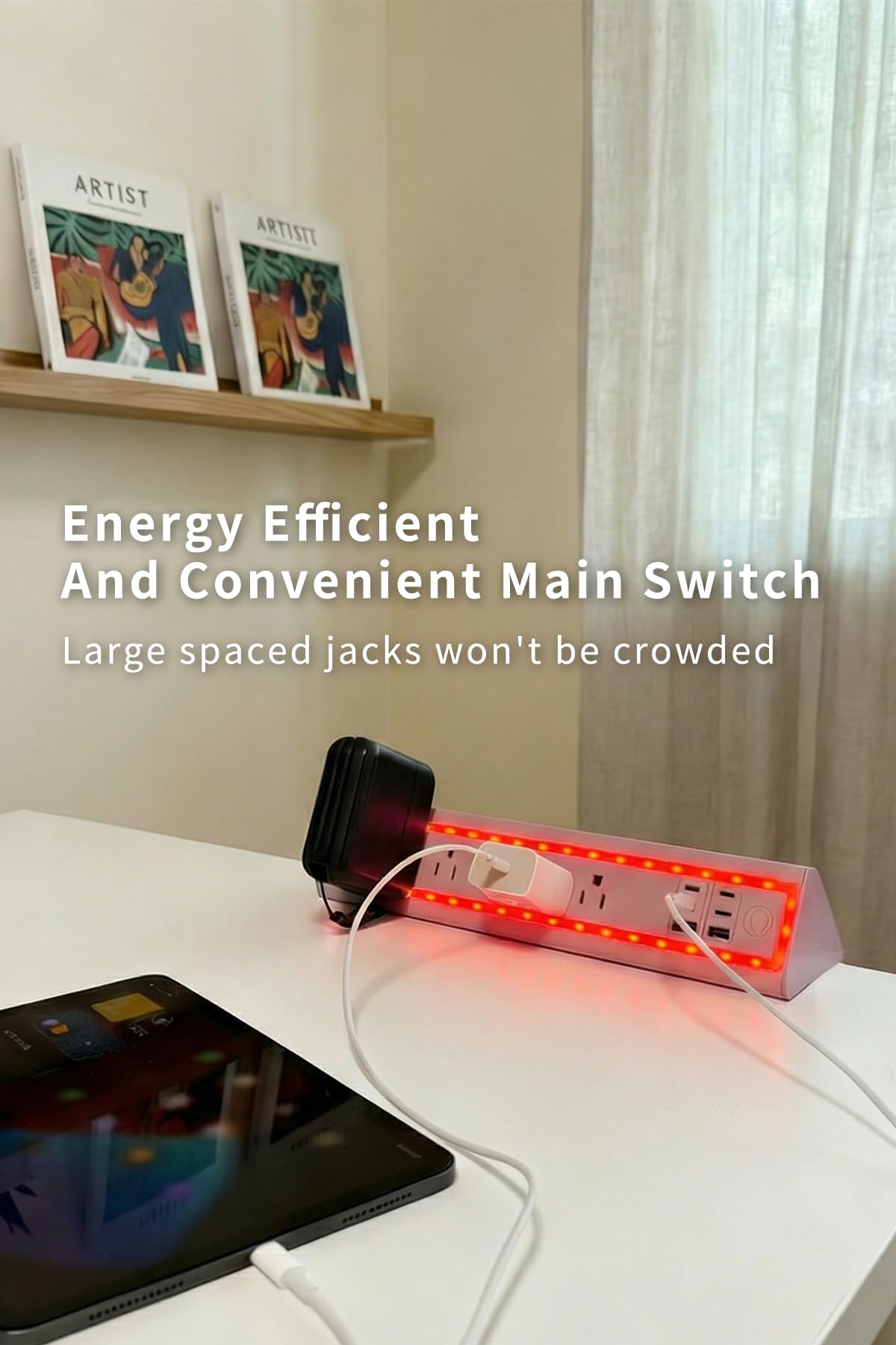 NYYTGE mounted horizontally beside monitor showing accessible outlets and ports