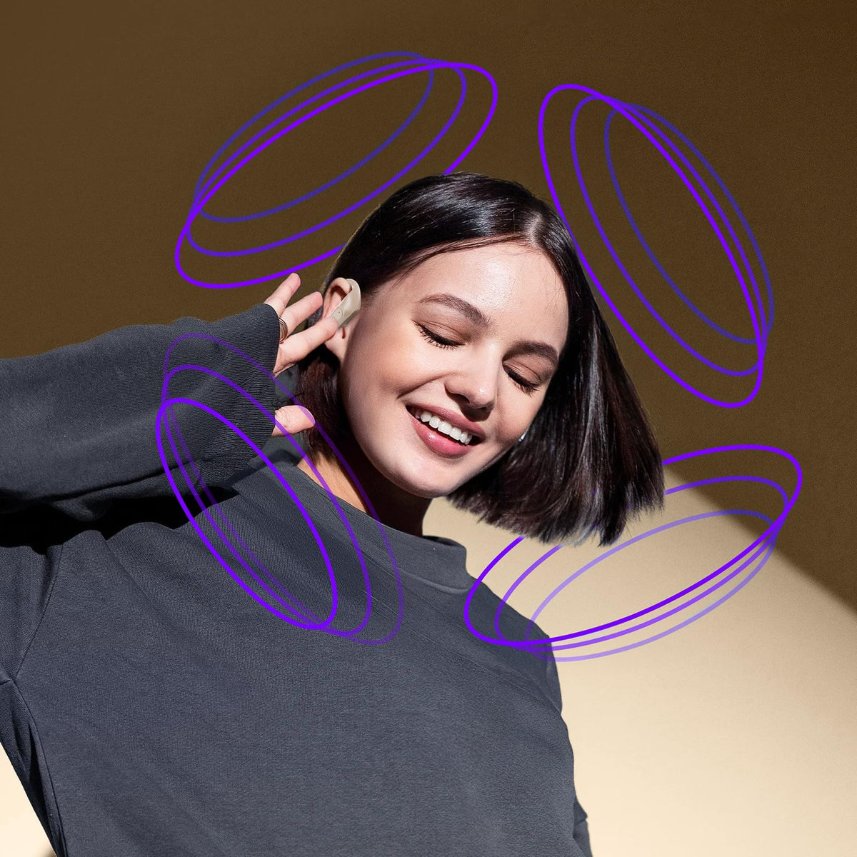 occiam close-up of earbud driver and ear hook highlights secure fit benefit
