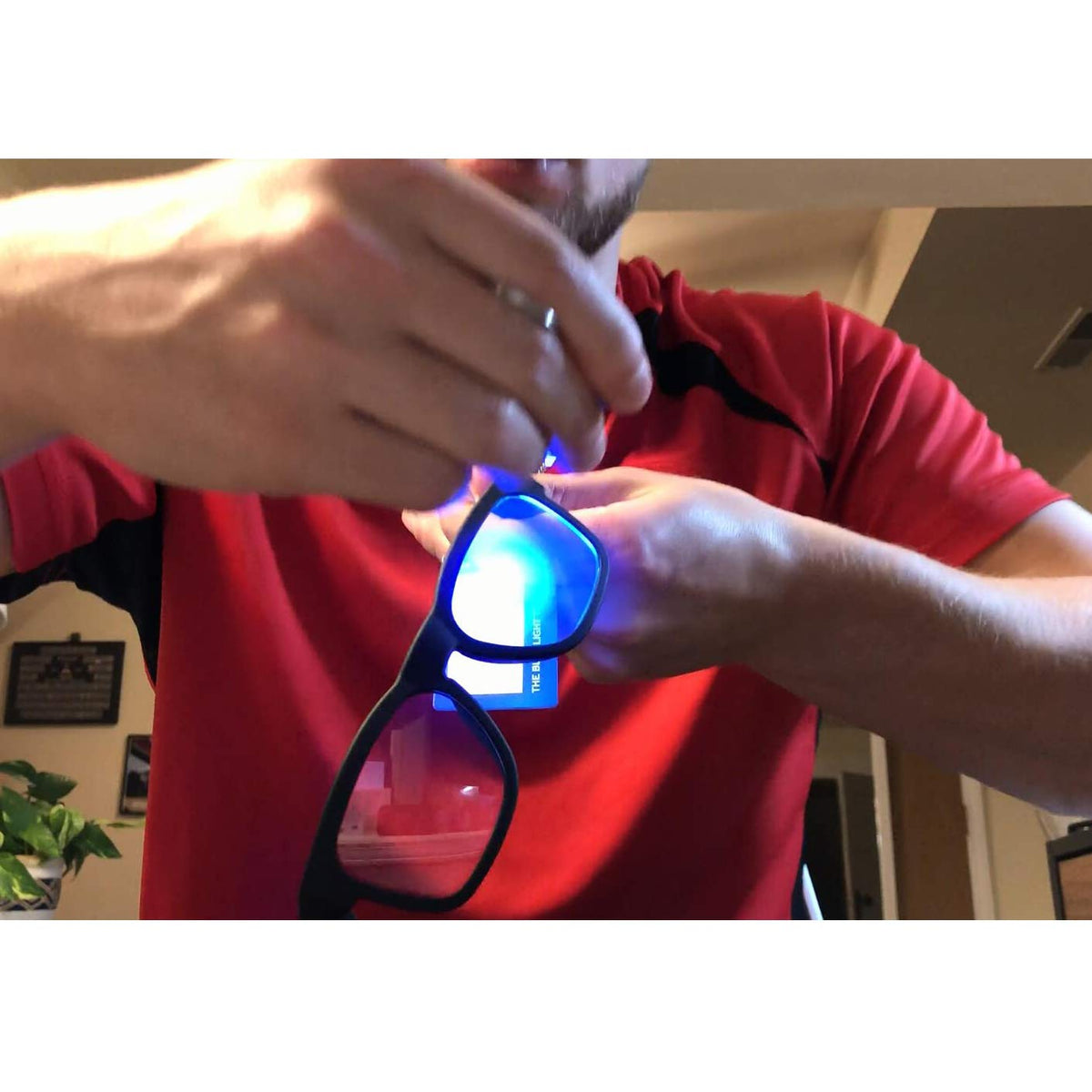 OhO sunshine held in hand to show compact size and lightweight comfort benefit