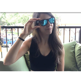 OhO sunshine being worn during a city commute showing hands‑free calls and voice control