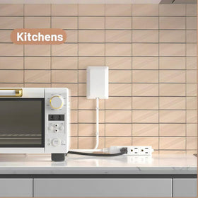 OKCHILD three-outlet power strip on desk supports multiple devices at once.