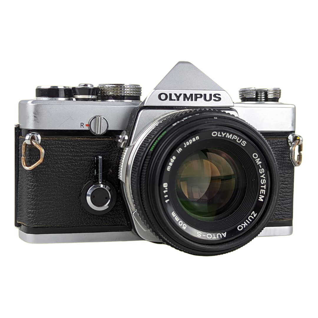 Olympus OM-1 with 50mm f1-8 lens close-up highlighting bright, sharp low-light potential.