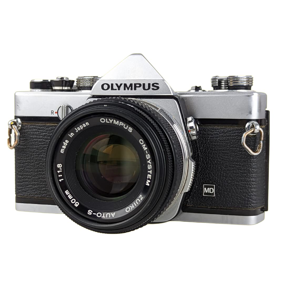 Olympus OM-1 dial controls side view with tactile shooting appeal.