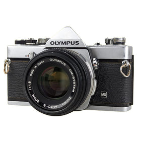 Olympus OM-1 dial controls side view with tactile shooting appeal.