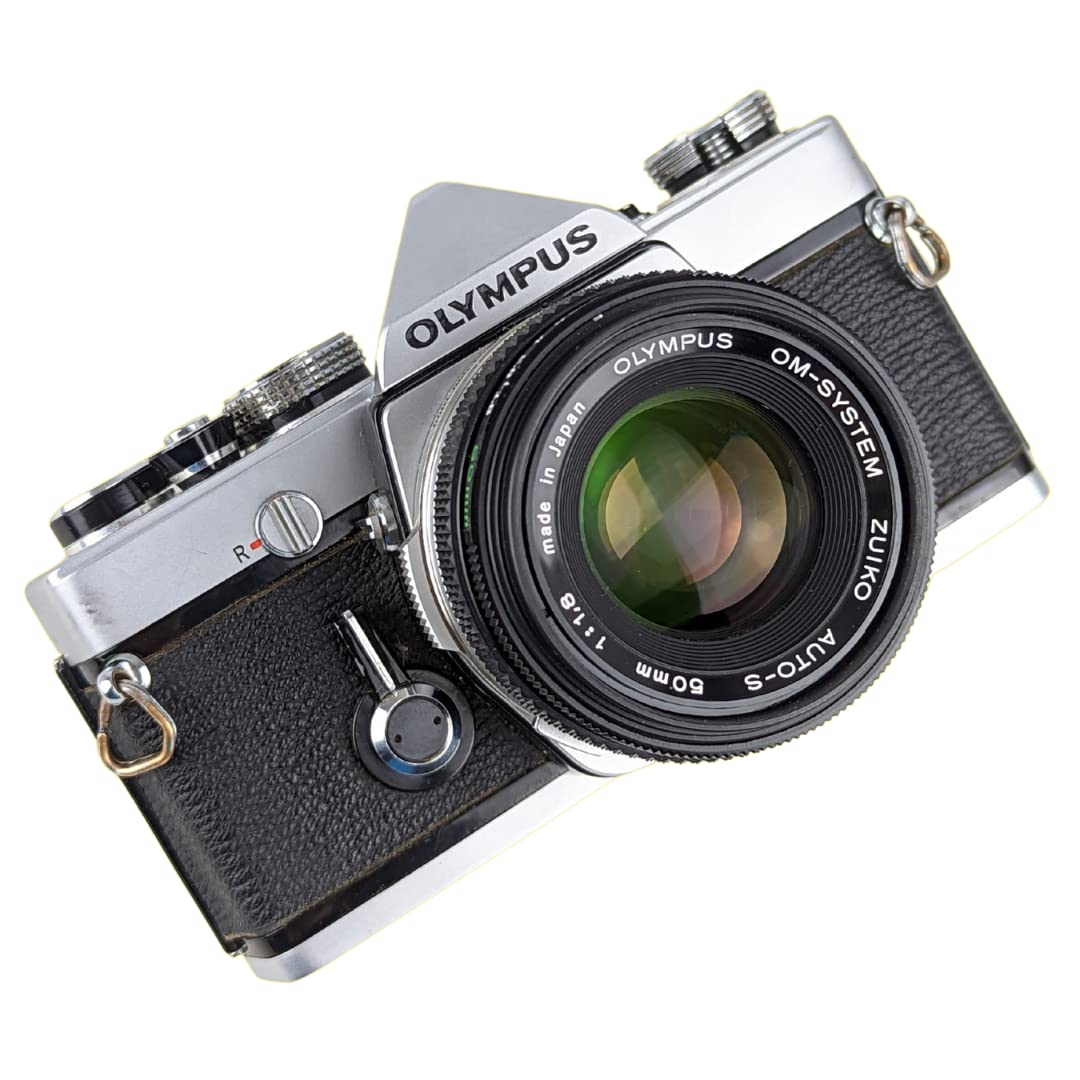 Olympus OM-1 included camera body and 50mm lens, ready to shoot.