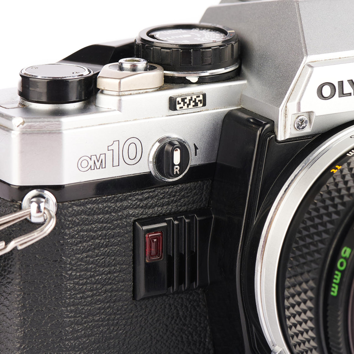 Olympus OM-10 film back showcasing classic film loading for creative projects