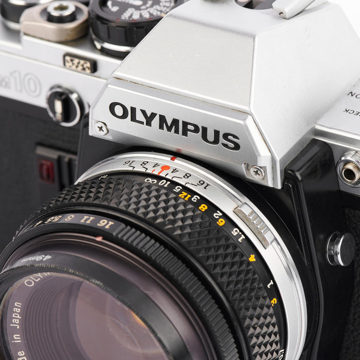 Olympus OM-10 renewed label signaling trusted refurbishment for renewed performance