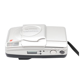 Olympus Superzoom 70 G built in flash for reliable low light shots.