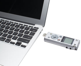 OM SYSTEM DM-720 side profile emphasizes compact metal body for discreet captures.