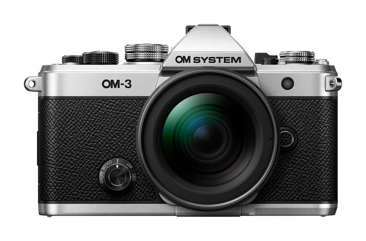 OM SYSTEM OM-3 silver front view showing premium build for travel