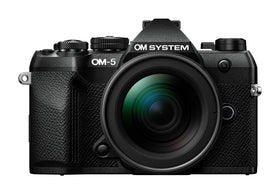 OM SYSTEM OM-5 Mark II front view shows its compact, travel-ready design for outdoor use.