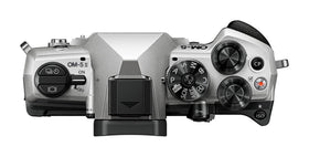 OM System OM-5 Mark II portable design for rugged hikes.