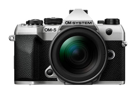 OM SYSTEM OM-5 Mark II in rugged outdoor setting shows reliability.