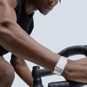 omee band worn on hiker showing durable outdoor-ready design