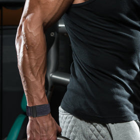 omee size adjustment and measure demonstrating adjustable fit for wrists