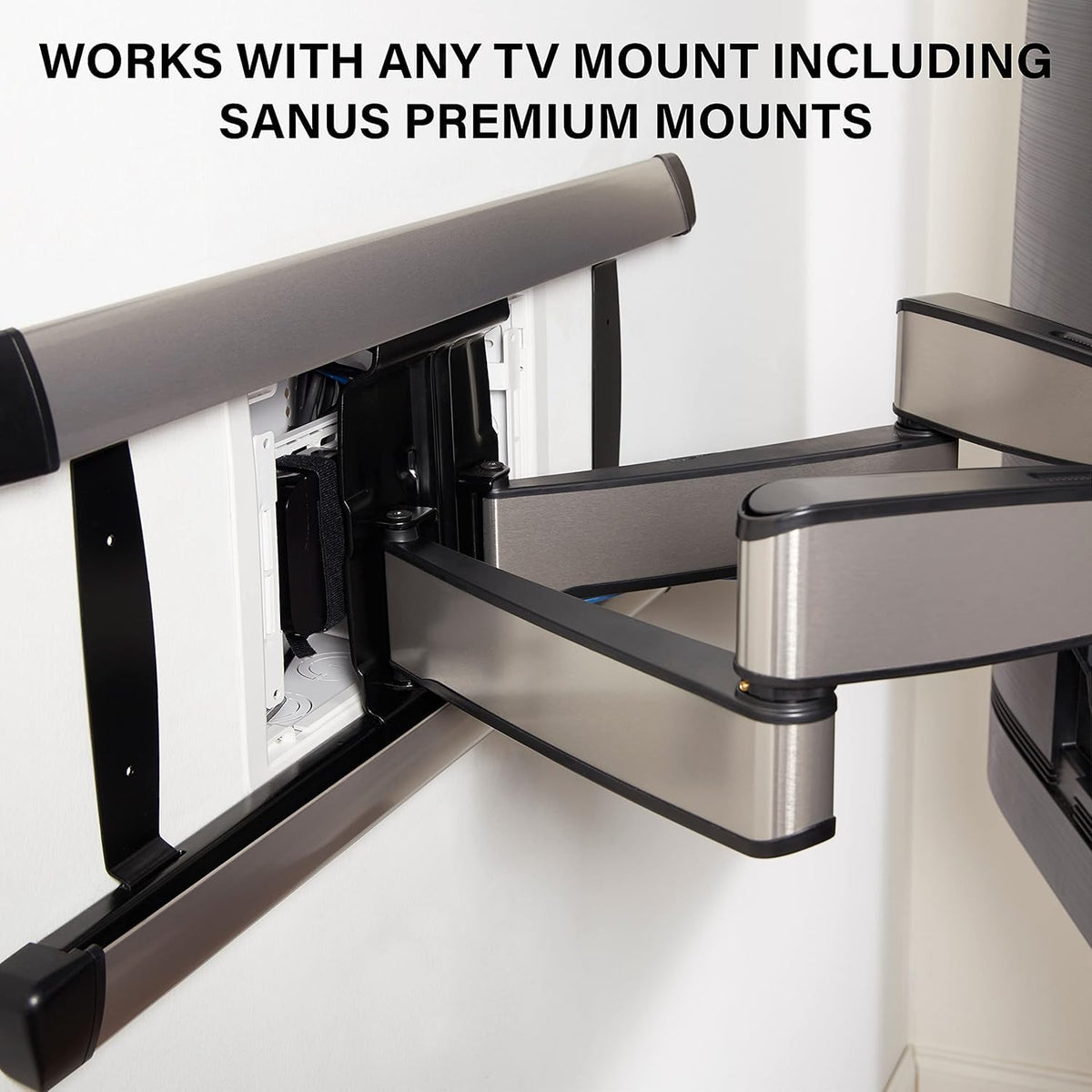 On-Q installed behind a TV in a living room illustrating clutter-free setup