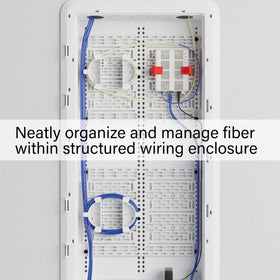 On-Q universal mounting plate inside a structured enclosure