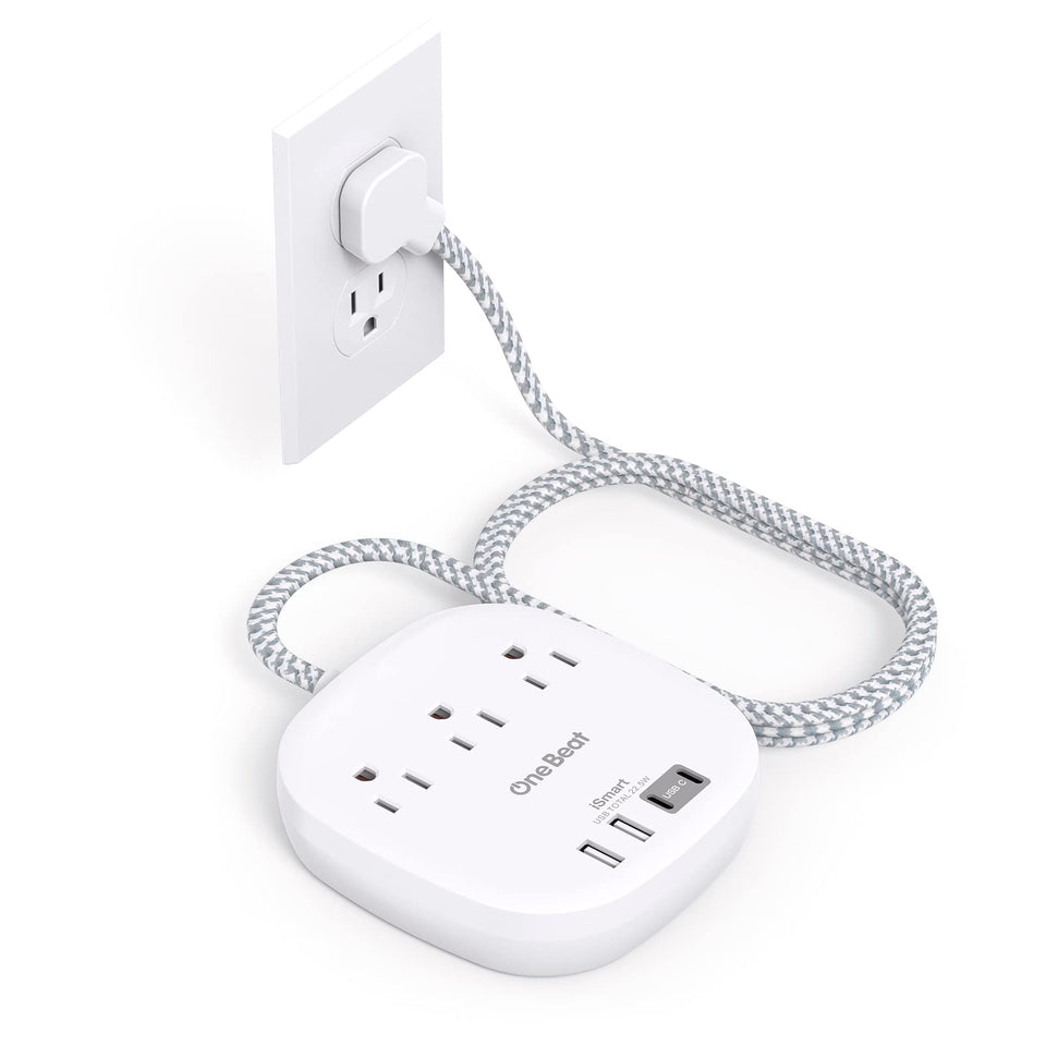 One Beat flat plug power strip front view for organized desk charging.
