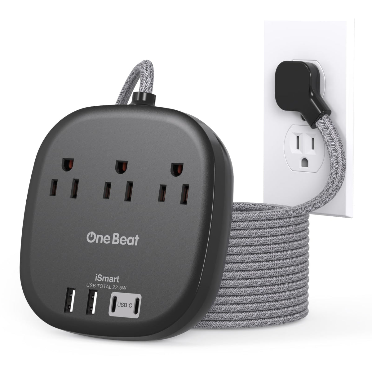 One Beat 10 ft extension cord powers multiple devices on a desk.