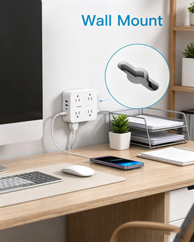One Beat on a desk powering laptop, lamp, and phone for organized workspace