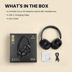 OneOdio Focus A5 next to a hand to show size and comfortable fit on head