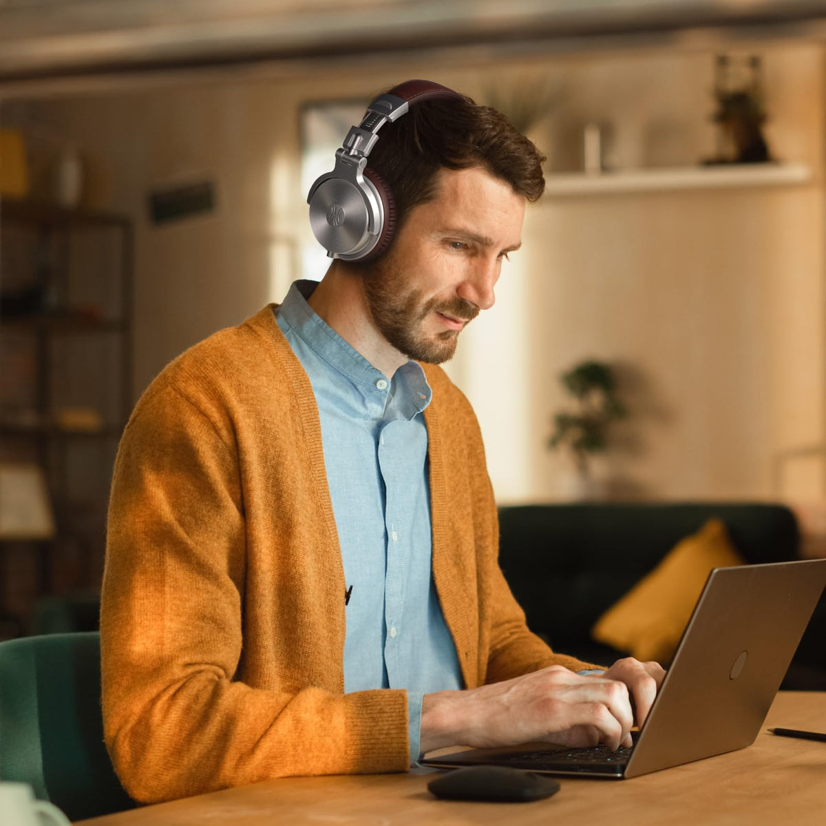 OneOdio headphones worn on model illustrating over-ear fit and immersive listening benefit