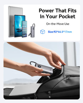 ORICO dock beside a laptop bag showing compact size for mobile professionals