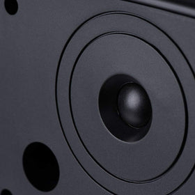 Two AP840 speakers mounted on a covered patio deliver balanced sound coverage