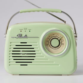 Ottosing compact design green radio fits small spaces like a kitchen counter.