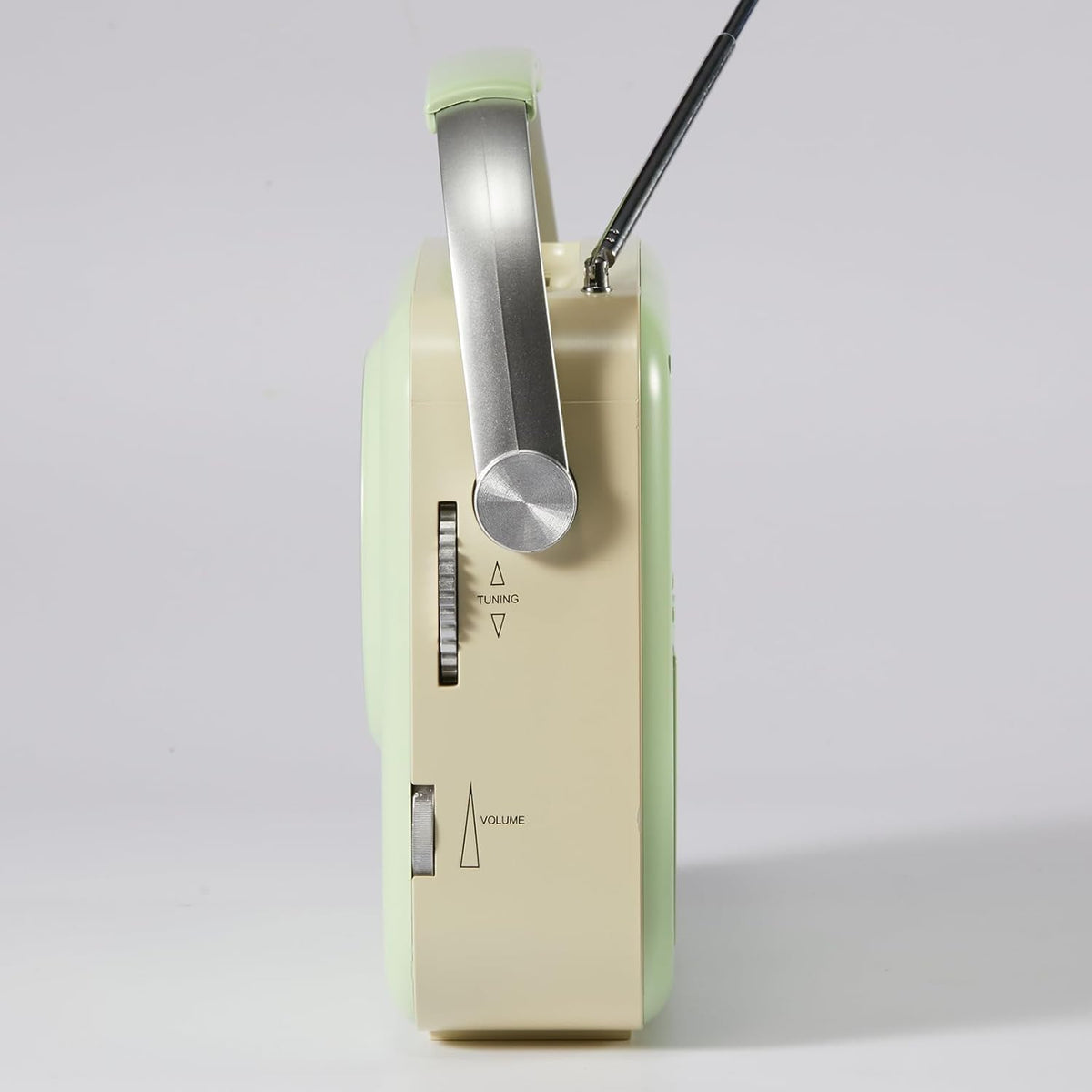 Ottosing green radio designed for outdoor use on camping trips and patios.