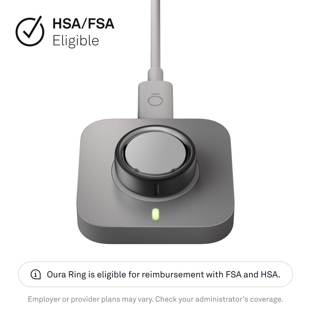 Oura Ring 4 Charger on desk ready for nightly charging.