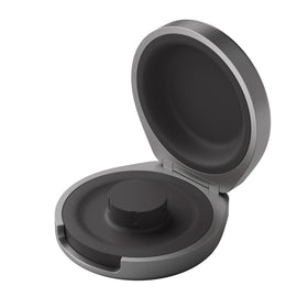 The OURA Ring 4 charging case opened, showcasing compact on-the-go design.