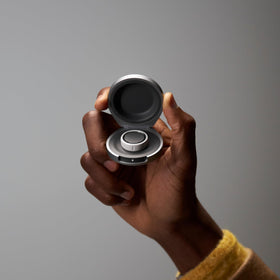 Oura Ring 4 charging case aluminum finish highlights durable build.