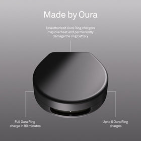 Oura Ring 4 charging case held in hand for travel convenience.