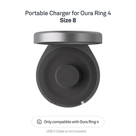 Oura Ring 4 charging case open with ring docked for charging.