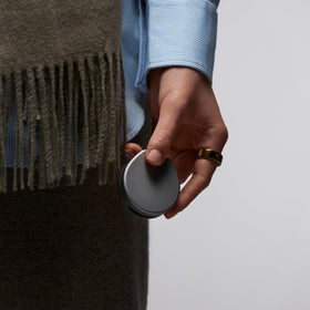 Oura Ring 4 Charging Case made from recycled aluminum for sustainable style.