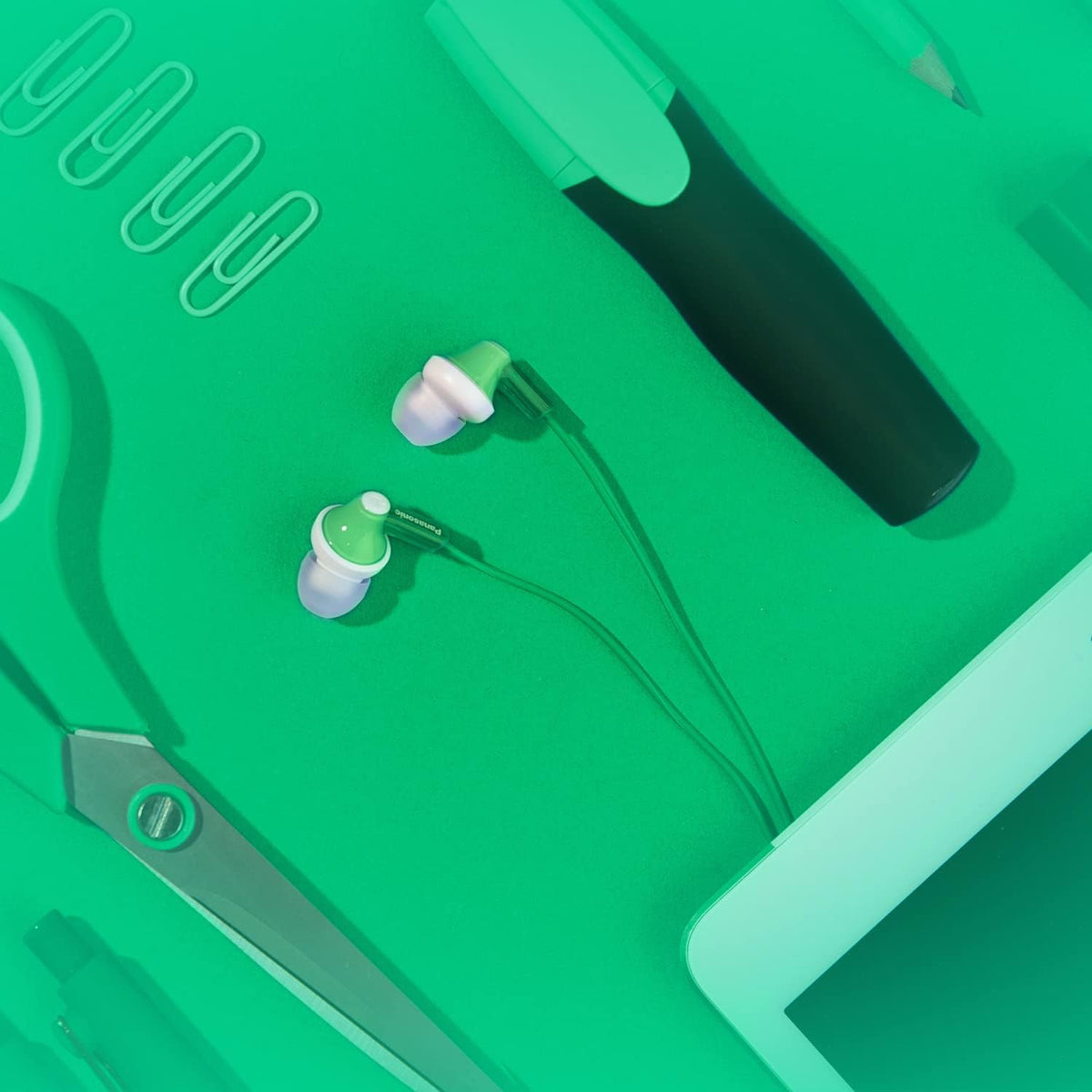 Panasonic earbuds in commuting scene showing portability and on-the-go use