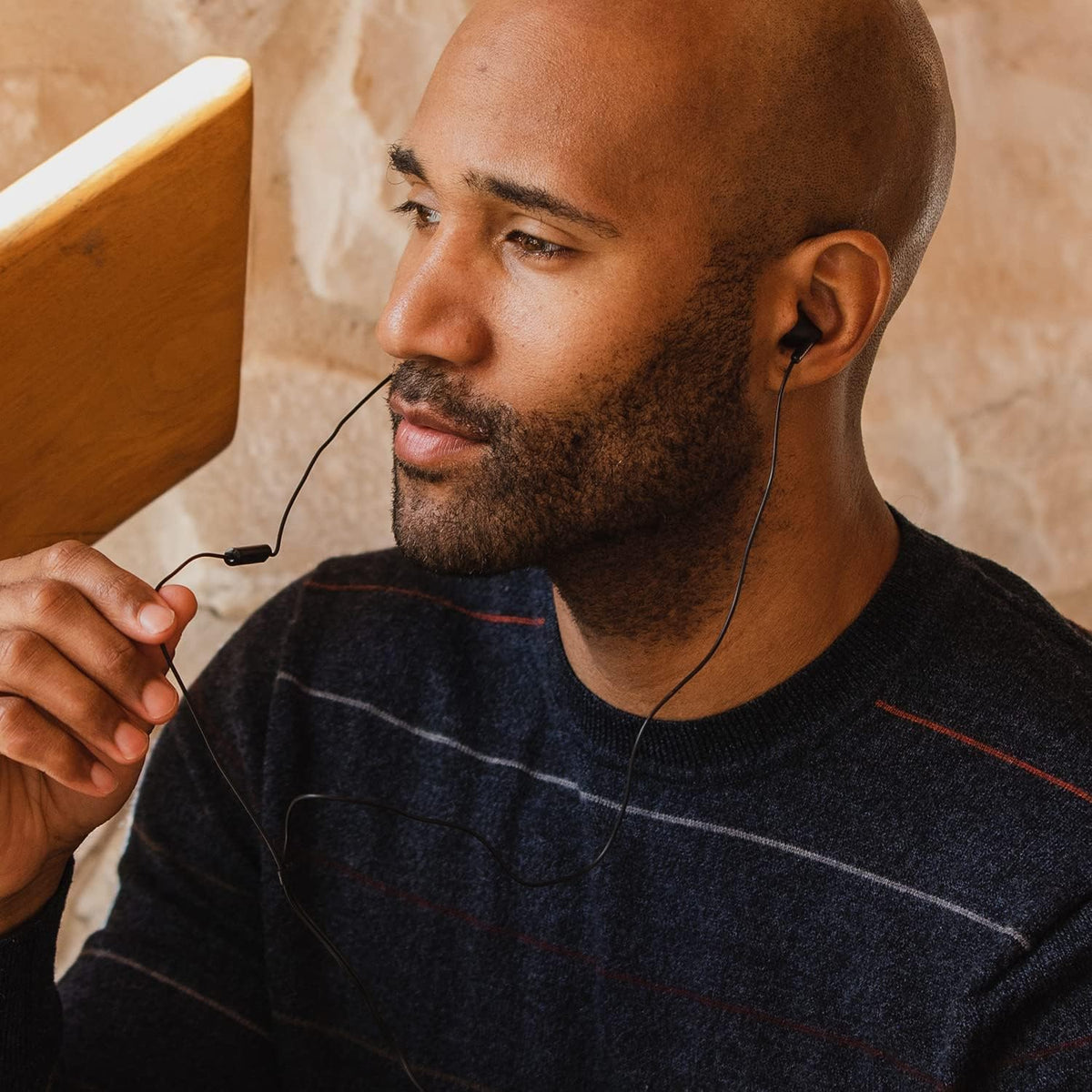 Long 3.6-foot cord stays accessible through clothing and bags.