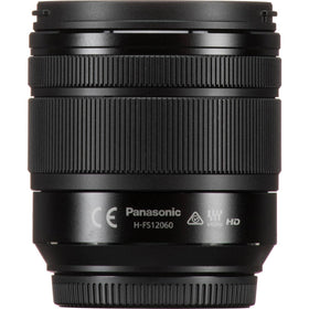 Panasonic LUMIX lens shown mounted on camera for travel photography.