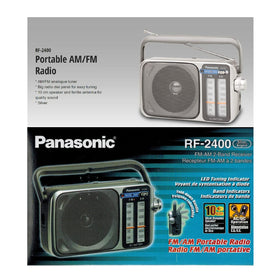 Panasonic RF-2400D on a picnic table in camping scene for emergency and outdoor use