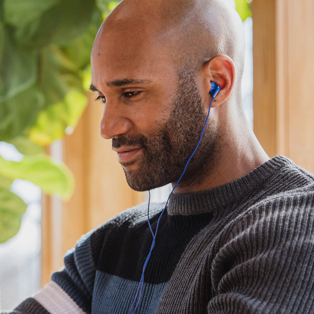 ErgoFit earbuds in metallic blue available in five vivid colors to match style