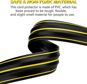 Papillon cord cover with yellow warning strips enhances visibility in high-traffic areas.