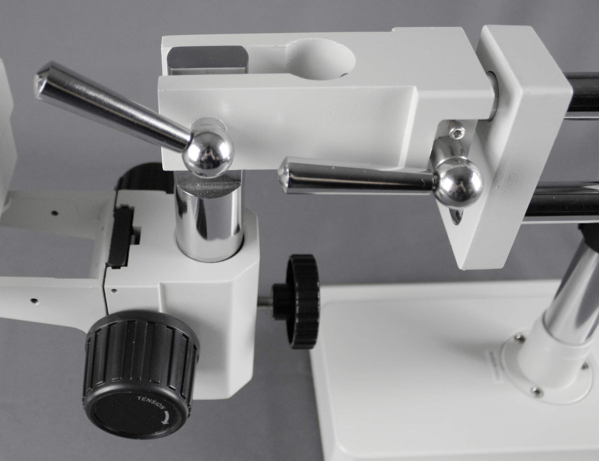 Parco 0.5x auxiliary lens extends magnification for close-up inspection.