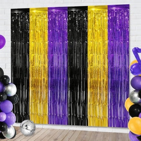 Partyzoa purple gold black fringe curtain backdrop adds a vibrant, photo-ready frame.