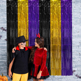 Partyzoa fringe backdrop brings festive shimmer ideal for Halloween or graduations.