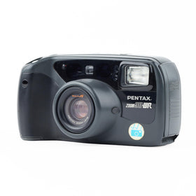 Pentax IQ Zoom 90WR built-in flash lights a dim scene