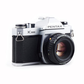 Profile view highlighting the compact, durable metal body and classic design